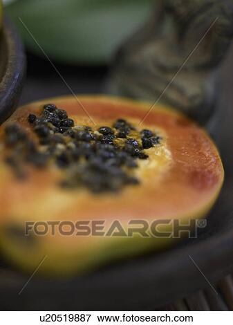 Stock Photo - Carambola and orchids. Fotosearch