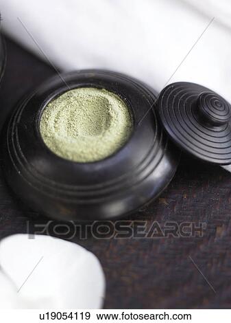 Stock Photo - Face powder in an ebony box. Fotosearch