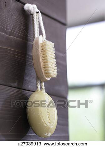 Stock Image - soap and massage brush. Fotosearch