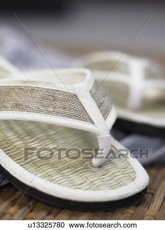 White flip-flops made of straw View Large Photo Image Stock Image - White flip-flops made of straw. Fotosearch