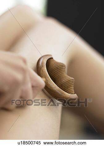 Stock Photography - wooden massage roller. Fotosearch
