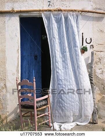Stock Image - blue wooden door. Fotosearch