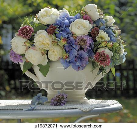 bouquet of summer flowers in blue and white View Large Photo Image Stock Image - bouquet of summer flowers in blue and white. Fotosearch