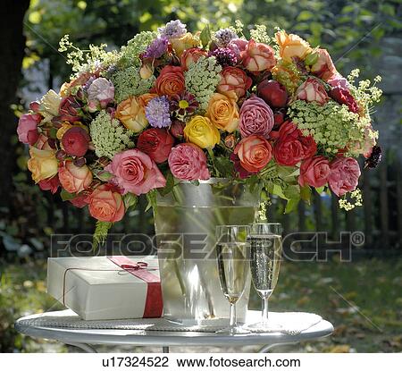 Stock Image - bouquet of summer flowers in red and yellow. Fotosearch
