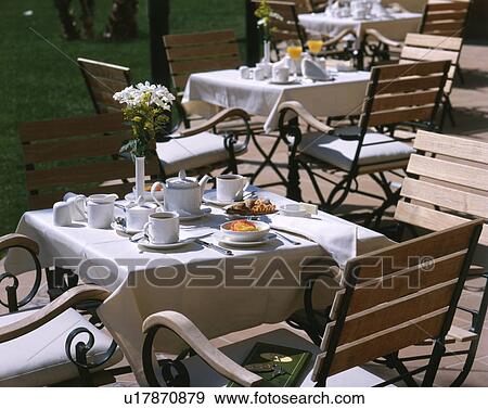 Stock Photo - breakfast in the garden. Fotosearch