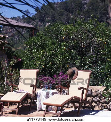 deckchairs on sunny terrace View Large Photo Image Stock Photo - deckchairs on sunny terrace. Fotosearch