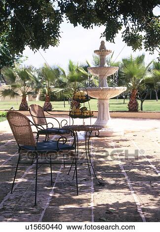 Stock Image - mediterranean terrace with chairs. Fotosearch