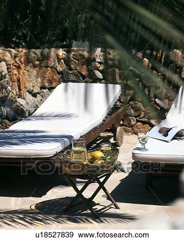 sun bath on a mediterranean terrace View Large Photo Image Stock Photo - sun bath on a mediterranean terrace. Fotosearch