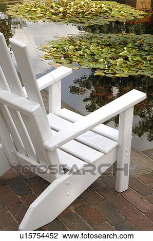 Stock Image - white deck chair. Fotosearch