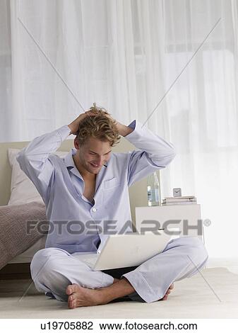 freelance working in pyjamas View Large Photo Image Stock Image - freelance working in pyjamas. Fotosearch