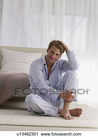 young man in blue pyjamas View Large Photo Image Stock Image - young man in blue pyjamas. Fotosearch