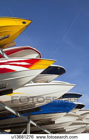 Boats stacked on rack View Large Photo Image Stock Photograph - Boats stacked on rack. Fotosearch