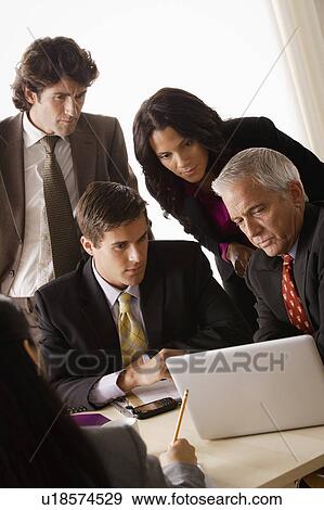 Stock Photo - Business meeting. Fotosearch
