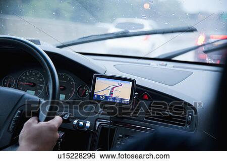 Stock Photograph - Car interior with GPS. Fotosearch