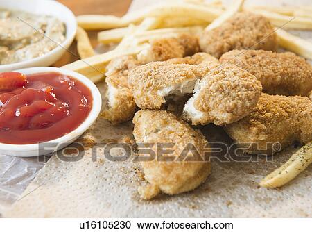 Close up of fried chicken fingers View Large Photo Image Stock Image - Close up of fried chicken fingers. Fotosearch