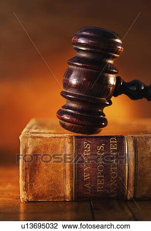Close-up of gavel on lawyer book View Large Photo Image Stock Image - Close-up of gavel on lawyer book. Fotosearch