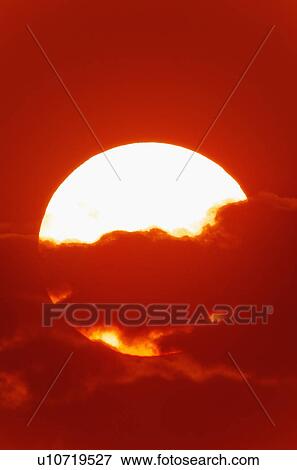 Close-up of large red sun View Large Photo Image Stock Photo - Close-up of large red sun. Fotosearch