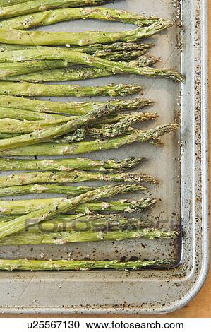 Close up of roasted asparagus on baking sheet View Large Photo Image Stock Image - Close up of roasted asparagus on baking sheet. Fotosearch