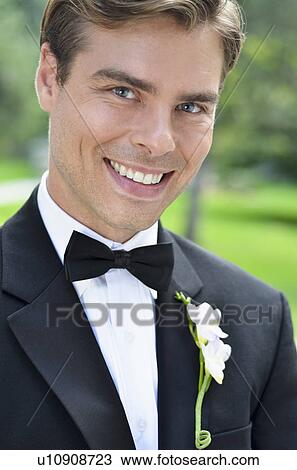 Stock Image - Close-up of smiling groom. Fotosearch