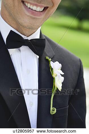 Stock Photo - Close-up of smiling groom. Fotosearch