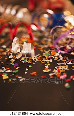 Colorful ribbons and confetti View Large Photo Image Picture - Colorful ribbons and confetti. Fotosearch