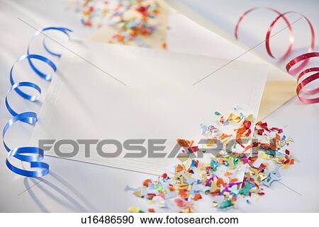 Stock Image - Confetti and ribbons. Fotosearch