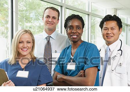 Doctor, hospital manager and two nurses posing for portrait View Large Photo Image Stock Photo - Doctor, hospital manager and two nurses posing for portrait. Fotosearch