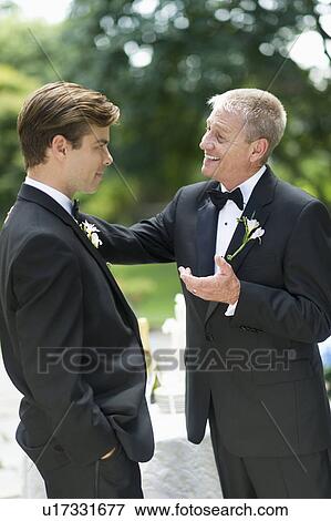 Father talking with groom View Large Photo Image Stock Photo - Father talking with groom. Fotosearch