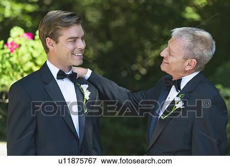 Father with bridegroom at wedding View Large Photo Image Stock Photo - Father with bridegroom at wedding. Fotosearch