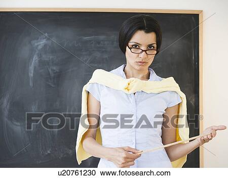 Stock Image - Female teacher with discipline. Fotosearch