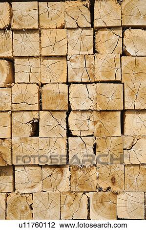 Stock Image - Full-frame shot of orderly timber stacks. Fotosearch