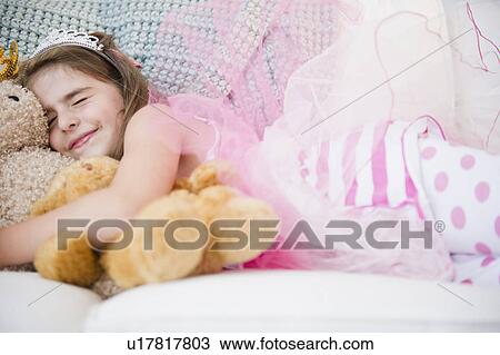 Girl ( 6-7) sleeping in costume and crown View Large Photo Image Stock Image - Girl ( 6-7) sleeping in costume and crown. Fotosearch