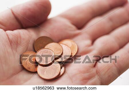 Hand with one cents coins View Large Photo Image Stock Image - Hand with one cents coins. Fotosearch