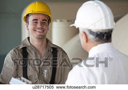 Manual worker and manager View Large Photo Image Stock Photography - Manual worker and manager. Fotosearch