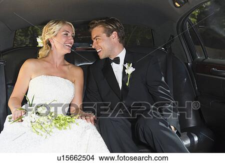 Married couple in limousine View Large Photo Image Picture - Married couple in limousine. Fotosearch