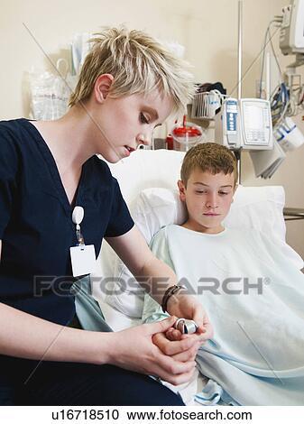 Nurse and boy (10-11) View Large Photo Image Stock Image - Nurse and boy (10-11). Fotosearch