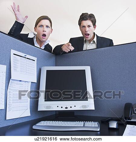 Stock Photograph - Office workers shouting in office cubicle. Fotosearch