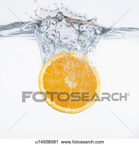 Orange splashing into water, studio shot View Large Photo Image Stock Image - Orange splashing into water, studio shot. Fotosearch