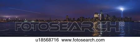 Stock Photograph - Panorama of New York at night with tribute in light. Fotosearch
