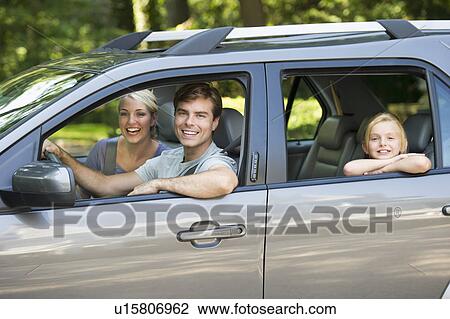 Parents with daughter (10-11) driving car View Large Photo Image Stock Image - Parents with daughter (10-11) driving car. Fotosearch