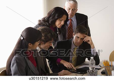 Stock Photo - People at business meeting. Fotosearch