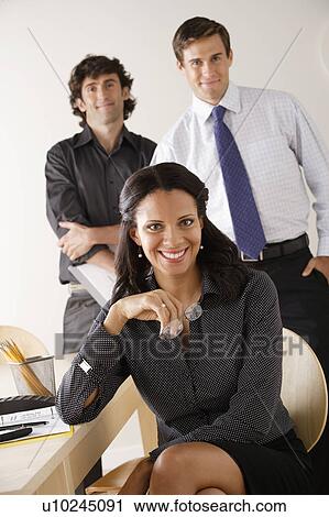 Portrait of business people in office View Large Photo Image Stock Image - Portrait of business people in office. Fotosearch