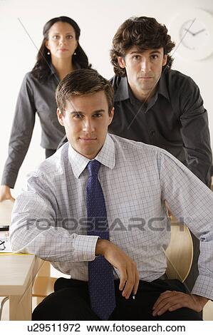 Portrait of business people in office View Large Photo Image Stock Image - Portrait of business people in office. Fotosearch