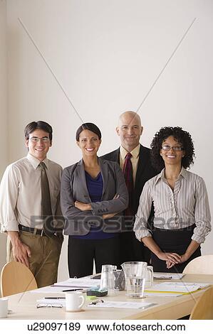 Stock Photo - Portrait of business team in board room. Fotosearch