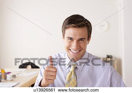 Portrait of businessman with thumbs up View Large Photo Image Stock Image - Portrait of businessman with thumbs up. Fotosearch