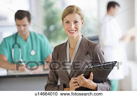 Portrait of businesswoman in hospital View Large Photo Image Stock Image - Portrait of businesswoman in hospital. Fotosearch