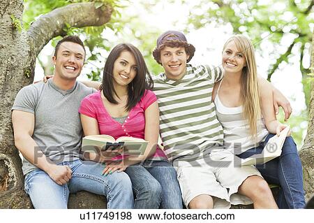 Portrait of college students in park View Large Photo Image Stock Photo - Portrait of college students in park. Fotosearch