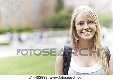 Stock Photo - Portrait of female college student. Fotosearch