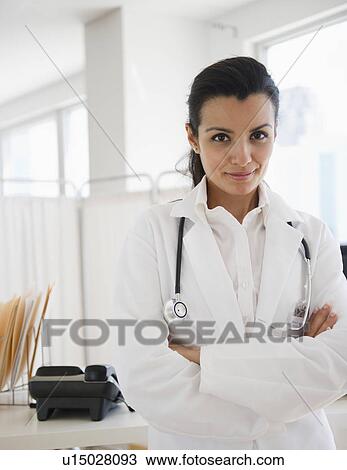 Portrait of female doctor in hospital View Large Photo Image Stock Image - Portrait of female doctor in hospital. Fotosearch