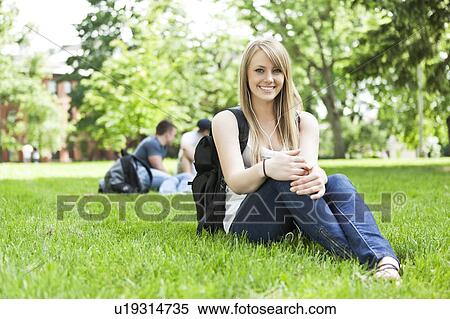 Portrait of female student on campus View Large Photo Image Stock Photography - Portrait of female student on campus. Fotosearch